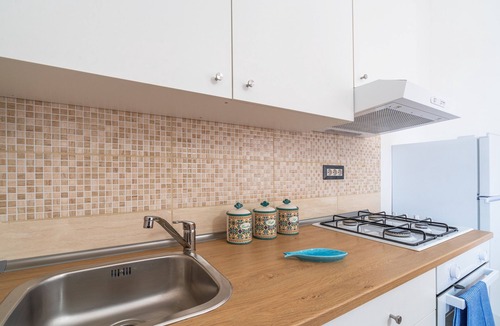 Granelli Apartment | Holiday Apartment "La Nassa" with Sea View, Private Terrace & Shared Garden