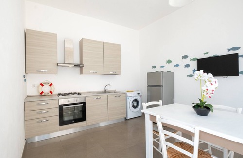 Torre Lapillo House | Holiday Home 'Arvèa – Lux Coastal Essence' with Shared Terrace, Wi-Fi and Air Conditioning