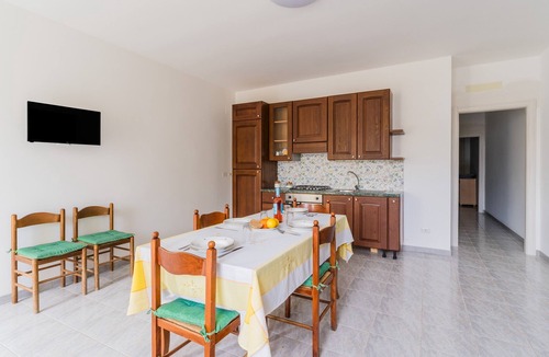 Sant'Isidoro House | Holiday Home 'Silvanella Apartment Sant'isidoro' with Private Garden, Balcony and Air Conditioning