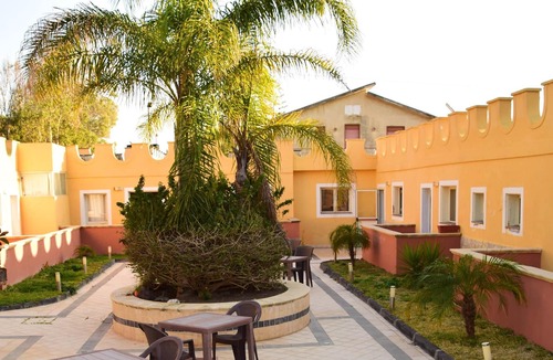 San Giorgio-Librino-San Giuseppe la Rena-Zia Lisa-Villaggio Sant'Agata Apartment | Homerez - 50 m away from the beach! Appartement for 3 ppl. with shared pool