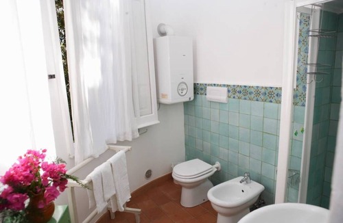 Capo d'Orlando Villa | Il Giardino dei Merli, a charming home from the early 1900s, a stone's throw from the sea
