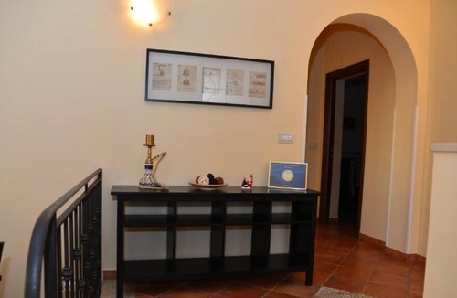 Villaggio del Pino-Le Ginestre House | Villa Cinzia - Appartamento con Vista Giardino