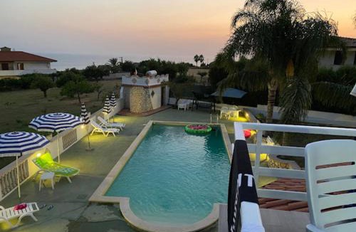 Ricadi Apartment | L'Oasi degli Dei - LOFT IN VILLA CON PISCINA TERRAZZA E VISTA MARE 500 m from beach - Free parking and wifi