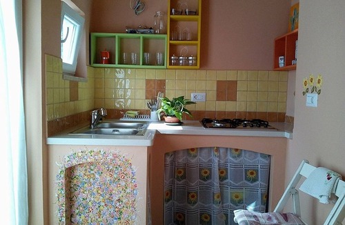 Condro Apartment | L 'Ulivo: dépendance with sea view with large terrace and fragrant garden.