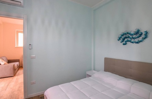 Scilla Apartment | Look forward to a beautiful view of the sea in this beachfront vacation rental.