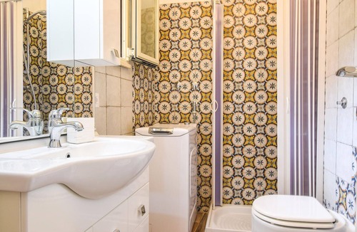 Scilla Apartment | Look forward to a beautiful view of the sea in this beachfront vacation rental.