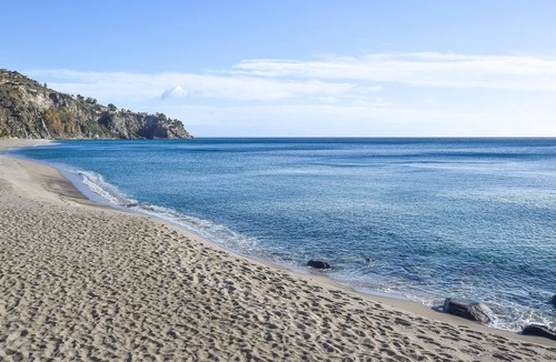 Scilla Apartment | Look forward to a beautiful view of the sea in this beachfront vacation rental.