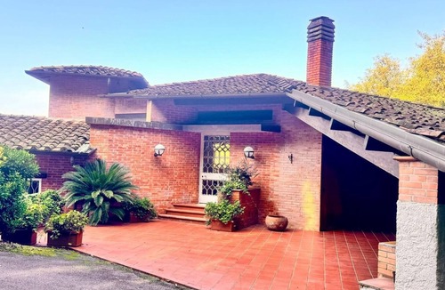 Piano di Mommio Villa | Luxury Vintage Villa: 1970s charm, pool and sea view in a signature design