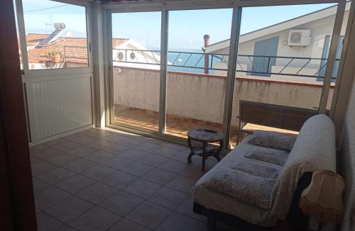 Oliveri House | Mansarda con terrazzo vista mare