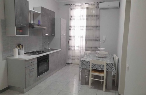 Mascali House | Marano House Relax in this quiet space in a central location.