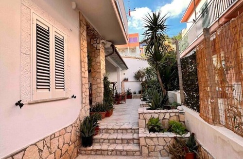 Marina di Palma Apartment | Modern oasis. 1 minute walk to the beach. A/C