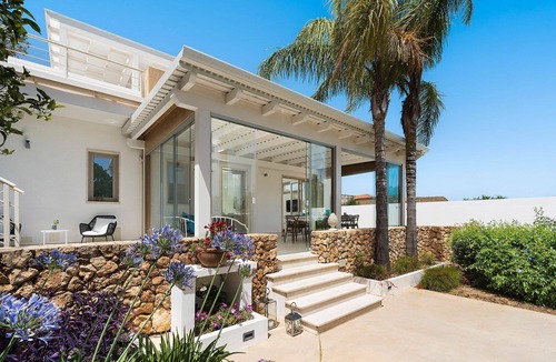 Marausa Villa | My Rental Homes - Sun Stone Villa surrounded by a lovely garden with private pool