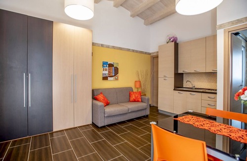 Marina di Ragusa Villa | Orange villa with lawn and use of swimming pool and jacuzzi only 300 meters from the sea