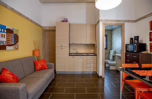 Marina di Ragusa Villa | Orange villa with lawn and use of swimming pool and jacuzzi only 300 meters from the sea