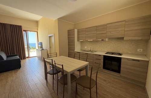 Bonifati Apartment | Sea-view apartment with a pool