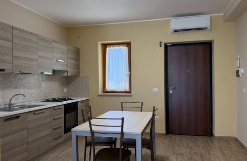 Bonifati Apartment | Sea-view apartment with a pool