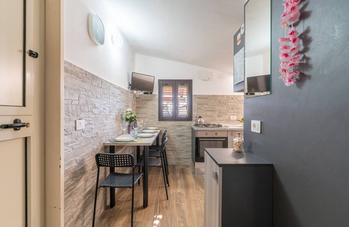 Agnone Bagni Apartment | Seaside Apartment 'Trifamiliare Garden - Conchiglia' with Private Terrace, Wi-Fi & AC