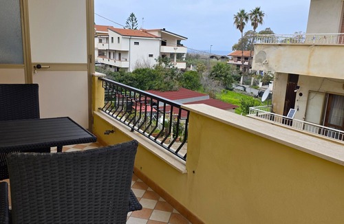 Santa Domenica Apartment | Spacious 3‑Bedroom with Wraparound Balcony, Sea Views & Steps to the Train