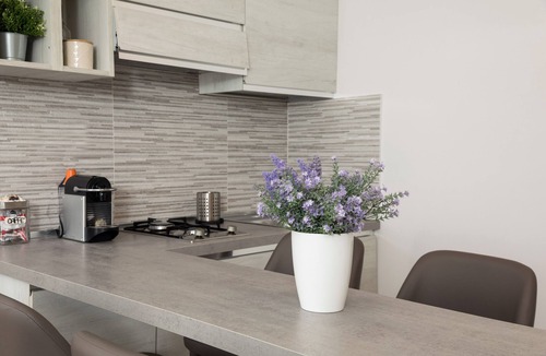 Chianchitta-Trappitello Apartment | Studio Apartment "Monolocale Glicine" with Balcony & A/C