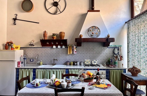 Castelbuono House | The Little House in the Courtyard, cozy vacation home with private courtyard in the center