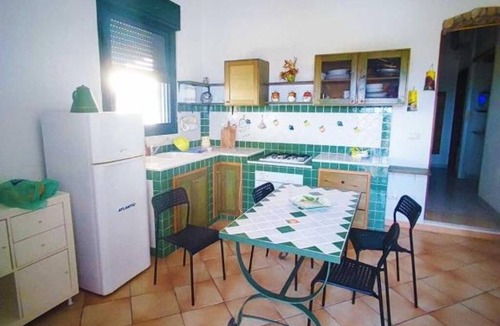 Marzamemi Apartment | Three Palms Houses San Lorenzo: Green Apartment