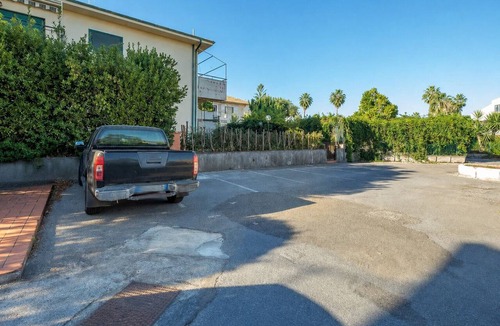 Torre Archirafi Apartment | Two-room apartment with a view of Mount Etna in Torre Archirafi, just a few minutes from the beach