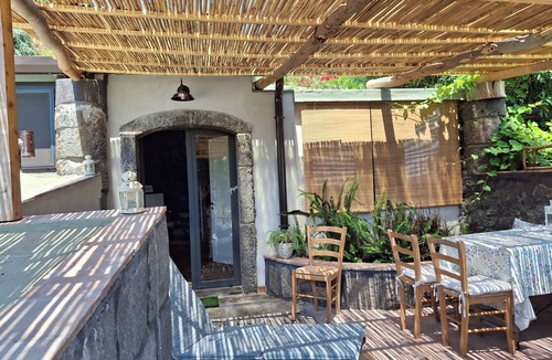 Carruba House | typical Sicilian stone house on the sea surrounded by greenery