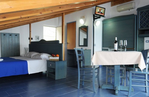 Province of Messina House | Vacation Home "Oasi Azzurra - Monolocale Standard 1" with Shared Pool & Shared Terraces