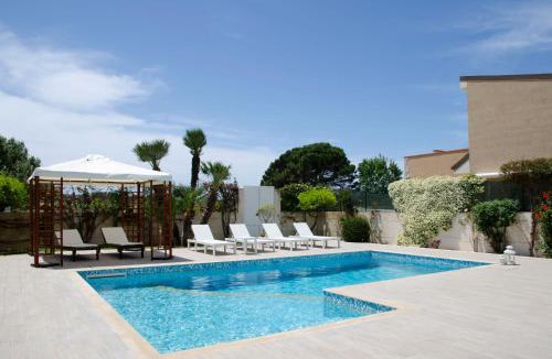 Santa Maria del Focallo Villa | Villa with Private Pool & Garden 10 min walk to the Beach
