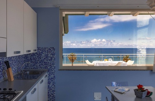 Capo d'Orlando Apartment | Zaffiro - 1-bedroom apartment with large panoramic sea view terrace and pool in the garden