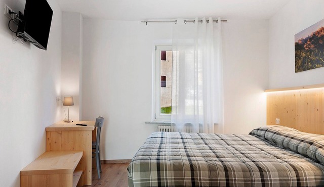 Apartment 'La Canonica Pino' with Mountain View, Shared Garden and Wi-Fi in Brez