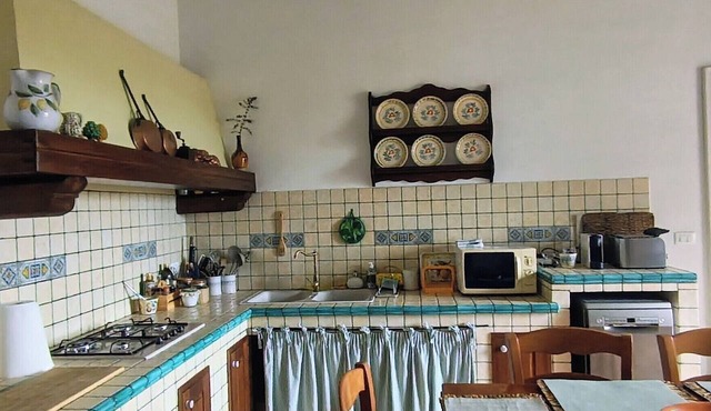 By the sea, large terrace enjoying fantastic views of Etna, shared pool