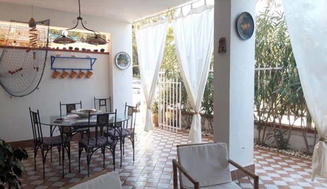 "Casa Perciata" Relax a few steps from the sea, cozy house with terrace