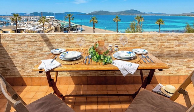 ClickSardinia Romantic Sea Loft with beachfront terrace and parking space in Alghero