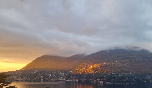 From the apartment and terrace view of the Lake, and with private parking space in Blevio