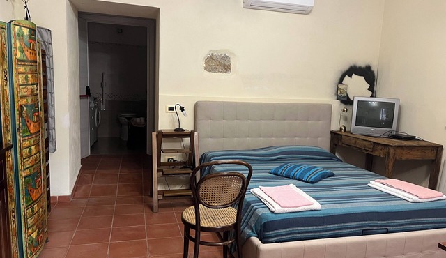 Ground floor apartment with porch on the surrounding garden