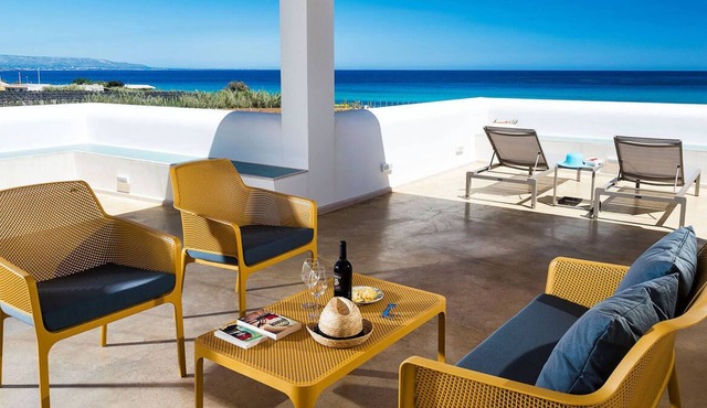 Private villa with sea view on a sandy beach