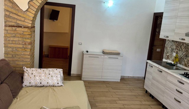 Torvaianica, Zoomarine, Rome: Seaside Apartment with Shared Garden in Lazio