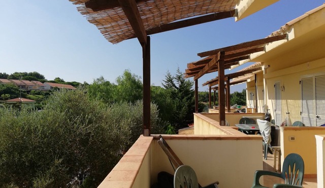 two-level cottage in capopiccolo resort with animation