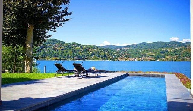 Villa Ronia: An elegant and modern four-story villa located right on the Lake Maggiore, with Free WI-FI. in Angera