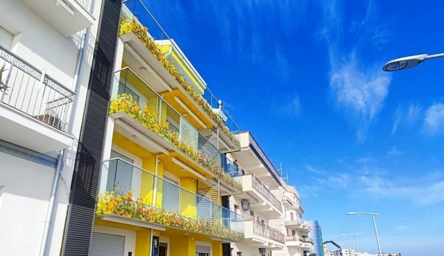 YELLOW DREAM Where the blue of the horizon becomes the main decor in Torre Melissa