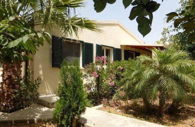 Beautiful centrally located bungalow directly on the sandy beach