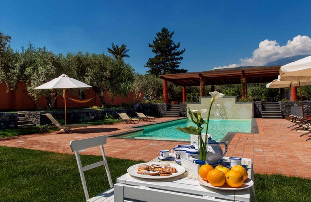 Holiday apartment with garden and outdoor swimming pool
