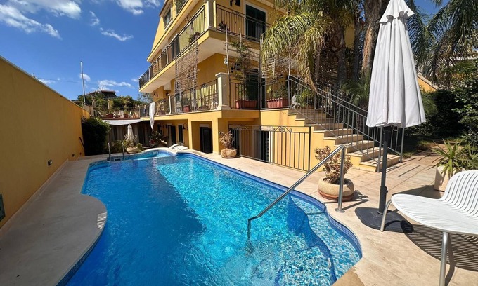 Marina di Ragusa Apartment | Apartment 'Athena In Villa' with Shared Pool, Wi-Fi and Air Conditioning