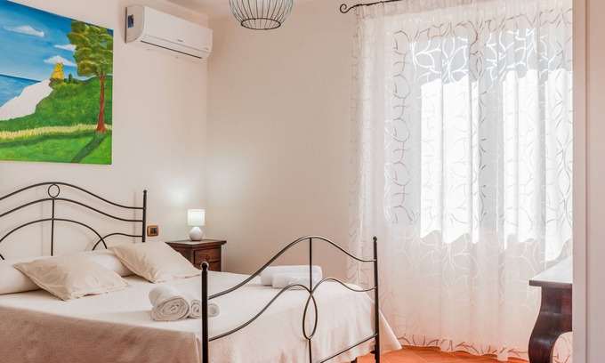 Montallegro Apartment | Apartment 'Quadrone Torre Salsa' with Sea View, Shared Terrace and Air Conditioning