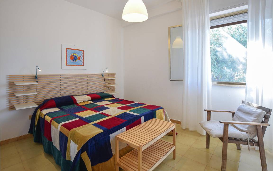 Photo of Bedroom in Punta Braccetto