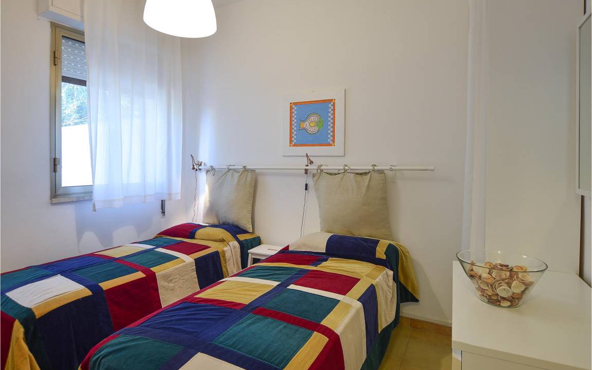 Photo of Bedroom in Punta Braccetto