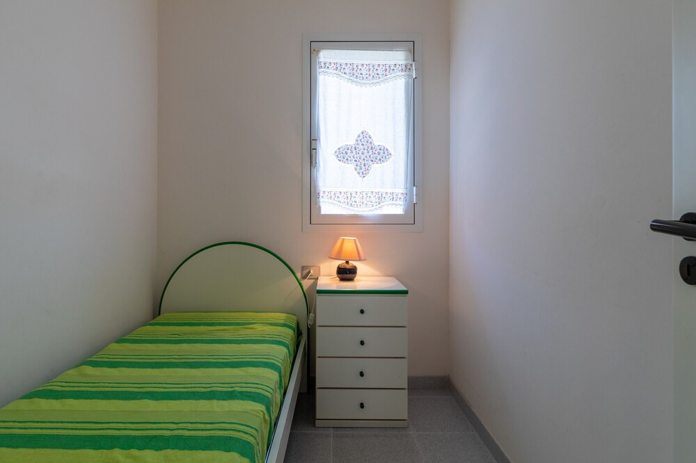 Photo of Bedroom in Punta Braccetto