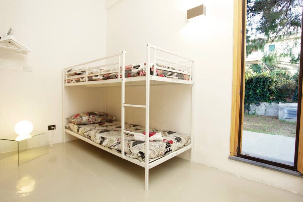 Photo of Bedroom in Torre Colonna-sperone