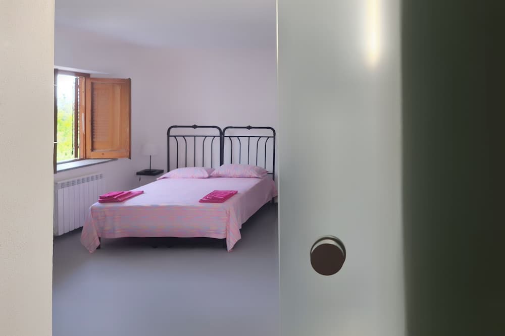 Photo of Bedroom in Torre Colonna-sperone